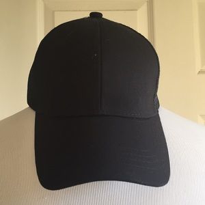 Black trucker hat with pony tail hole!